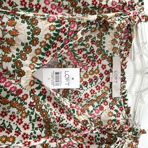 Multi color Lift blouse. NWT